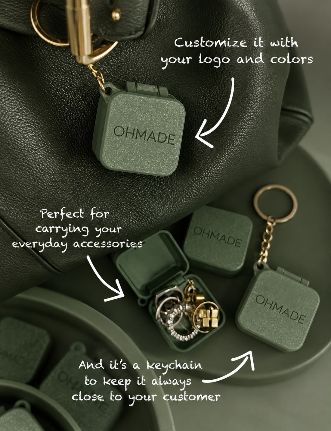 Jewellery box keychain clipped to a handbag, holding rings