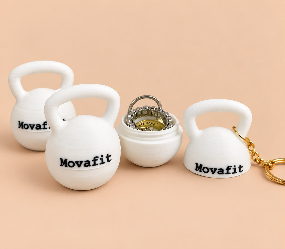 Kettlebell keychains with a gym logo that open to hold rings