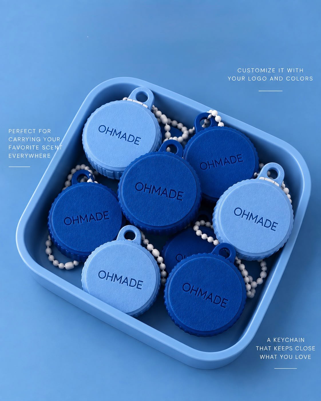 Blue sample container keychains with a custom logo